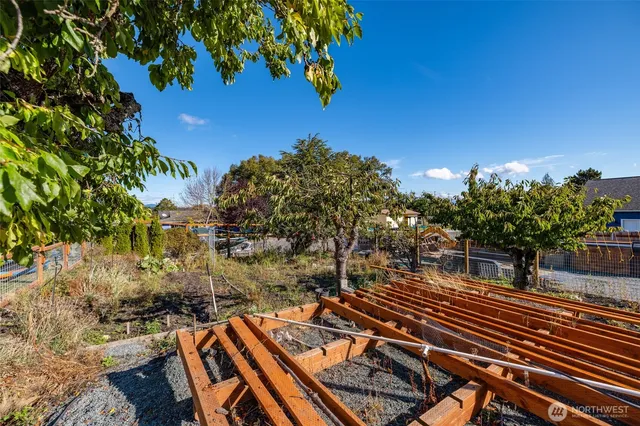 a view of a gym with a car parked beside