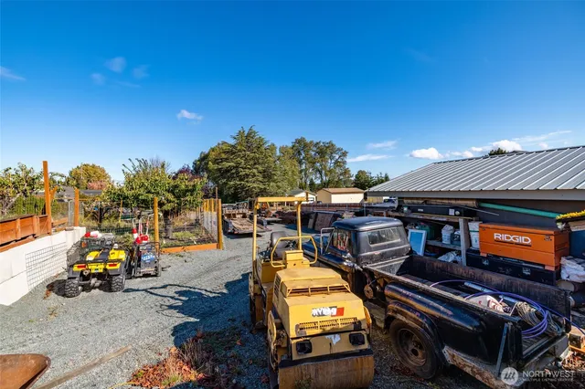 a view of a street with cars