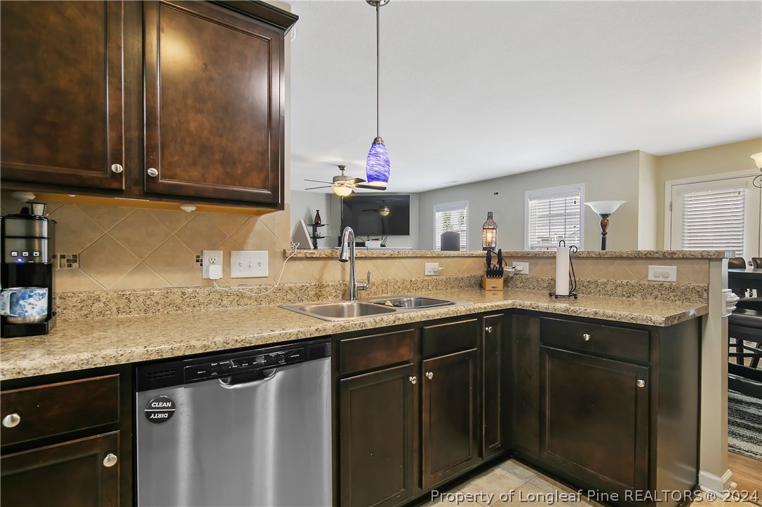 Undisclosed Address Hope Mills, NC 28348 - Photo 20 of 46 a kitchen with sink and cabinets