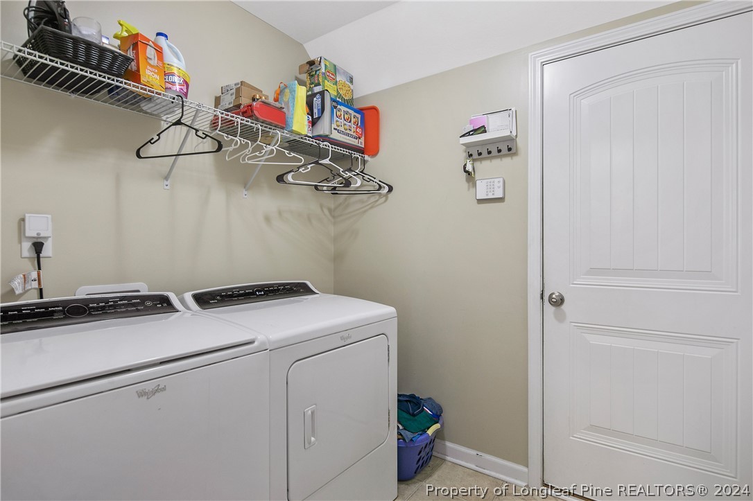 Undisclosed Address Hope Mills, NC 28348 - Photo 21 of 46 a utility room with dryer and washer
