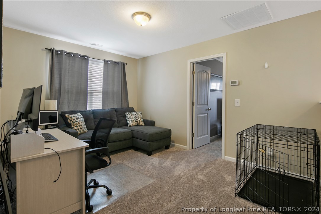 Undisclosed Address Hope Mills, NC 28348 - Photo 22 of 46 a living room with furniture and a window