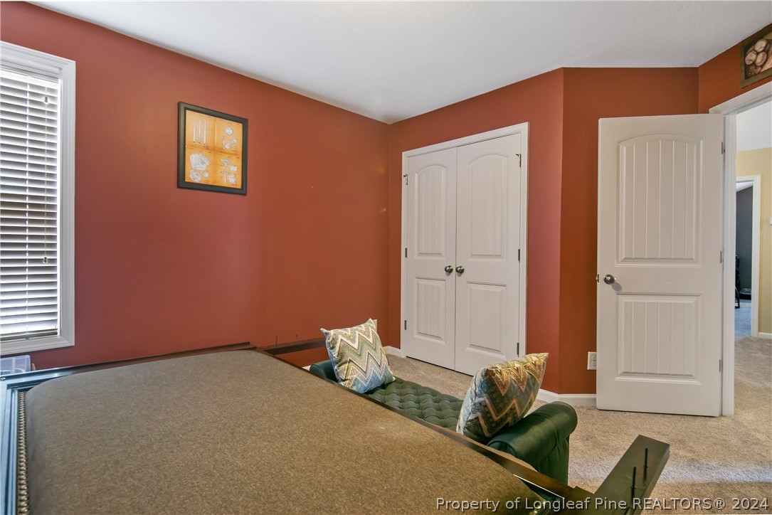 Undisclosed Address Hope Mills, NC 28348 - Photo 41 of 46 a bedroom with bed and a window