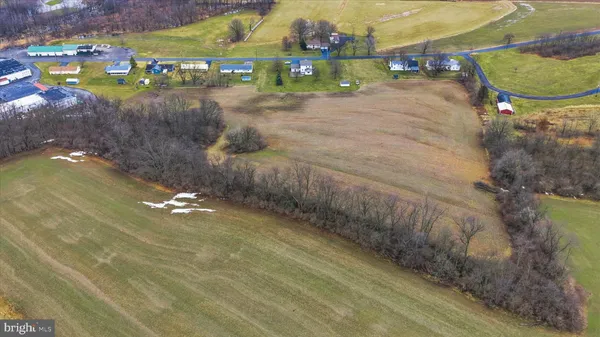 an aerial view of residential house with outdoor space