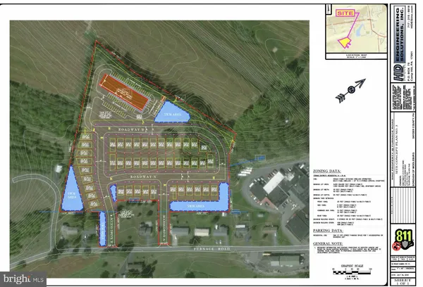 a view of a lake in middle of the town