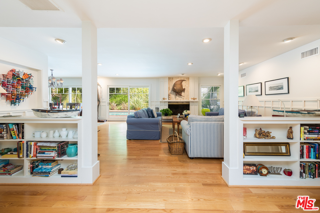 1826 Roscomare Road Los Angeles, CA 90077 - Photo 2 of 12 a living room with furniture and a kitchen view