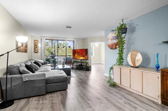 a view of a balcony with chairs