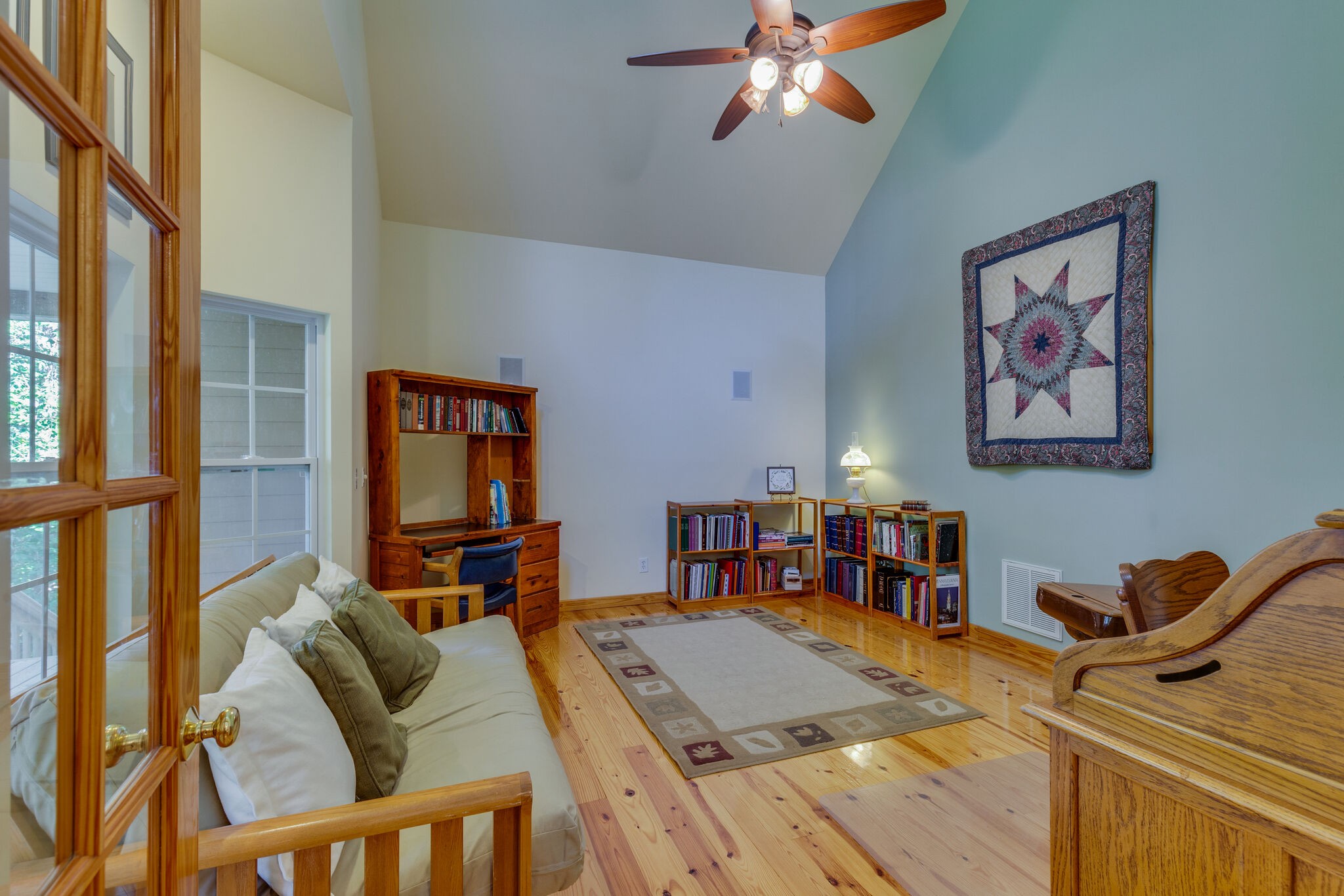 7430 Sleepy Hollow Road Fairview, TN 37062 - Photo 15 of 46 a living room with furniture and a flat screen tv with wooden floor