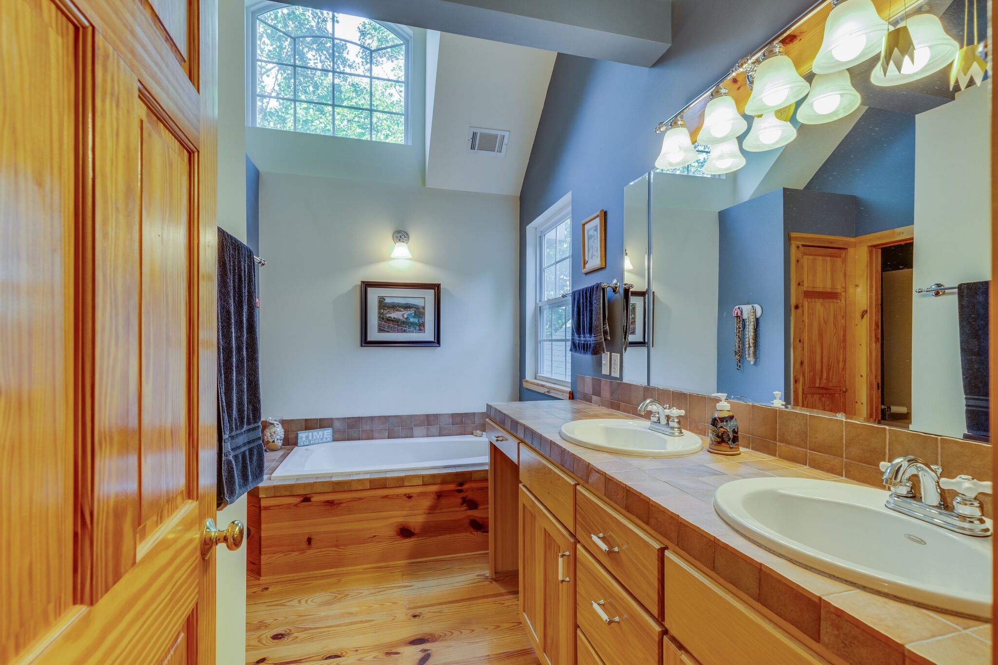 7430 Sleepy Hollow Road Fairview, TN 37062 - Photo 33 of 46 a bathroom with a sink and a mirror
