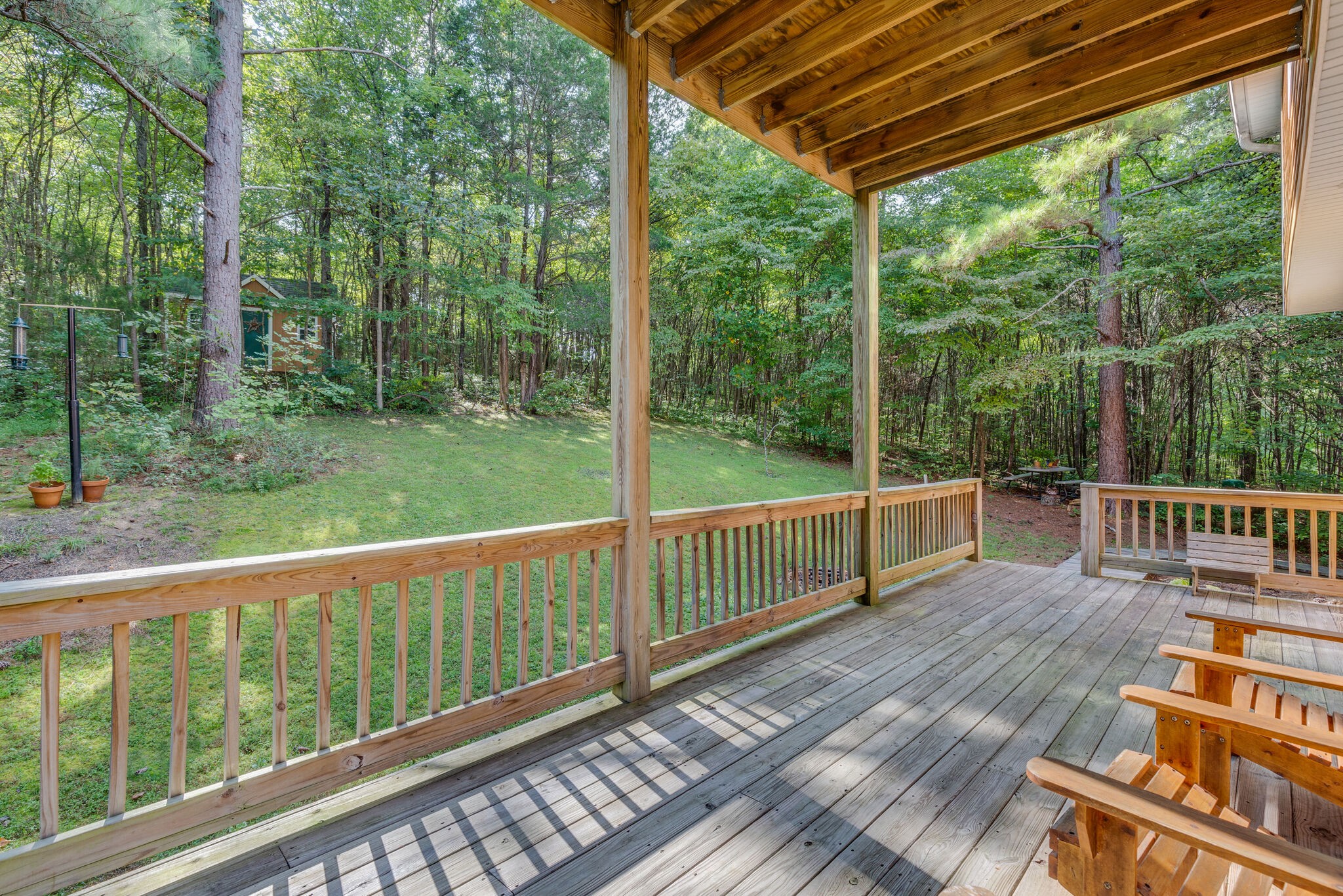 7430 Sleepy Hollow Road Fairview, TN 37062 - Photo 10 of 46 a view of a wooden deck next to a yard