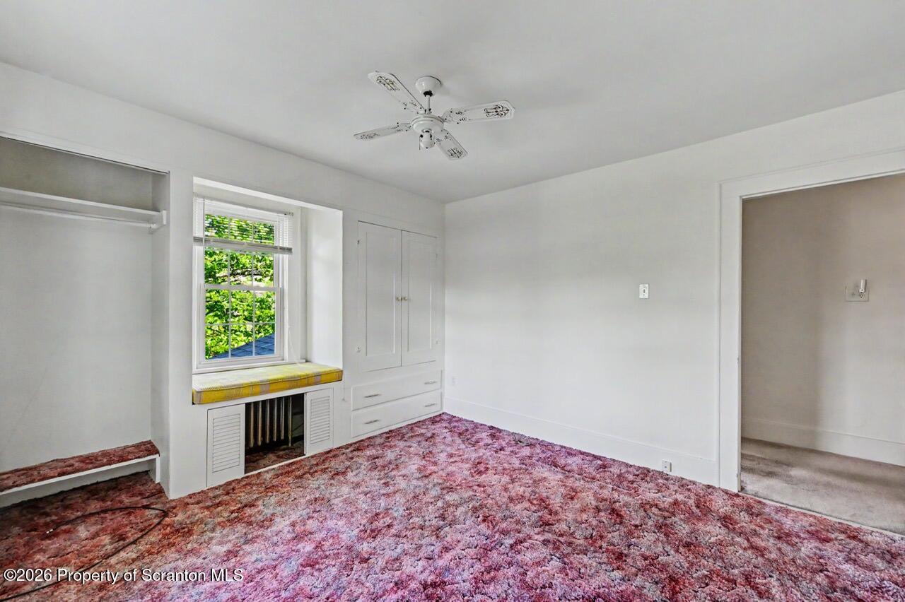 502 Layton Road Clarks Summit, PA 18411 - Photo 28 of 42 a bedroom with a bed and a window