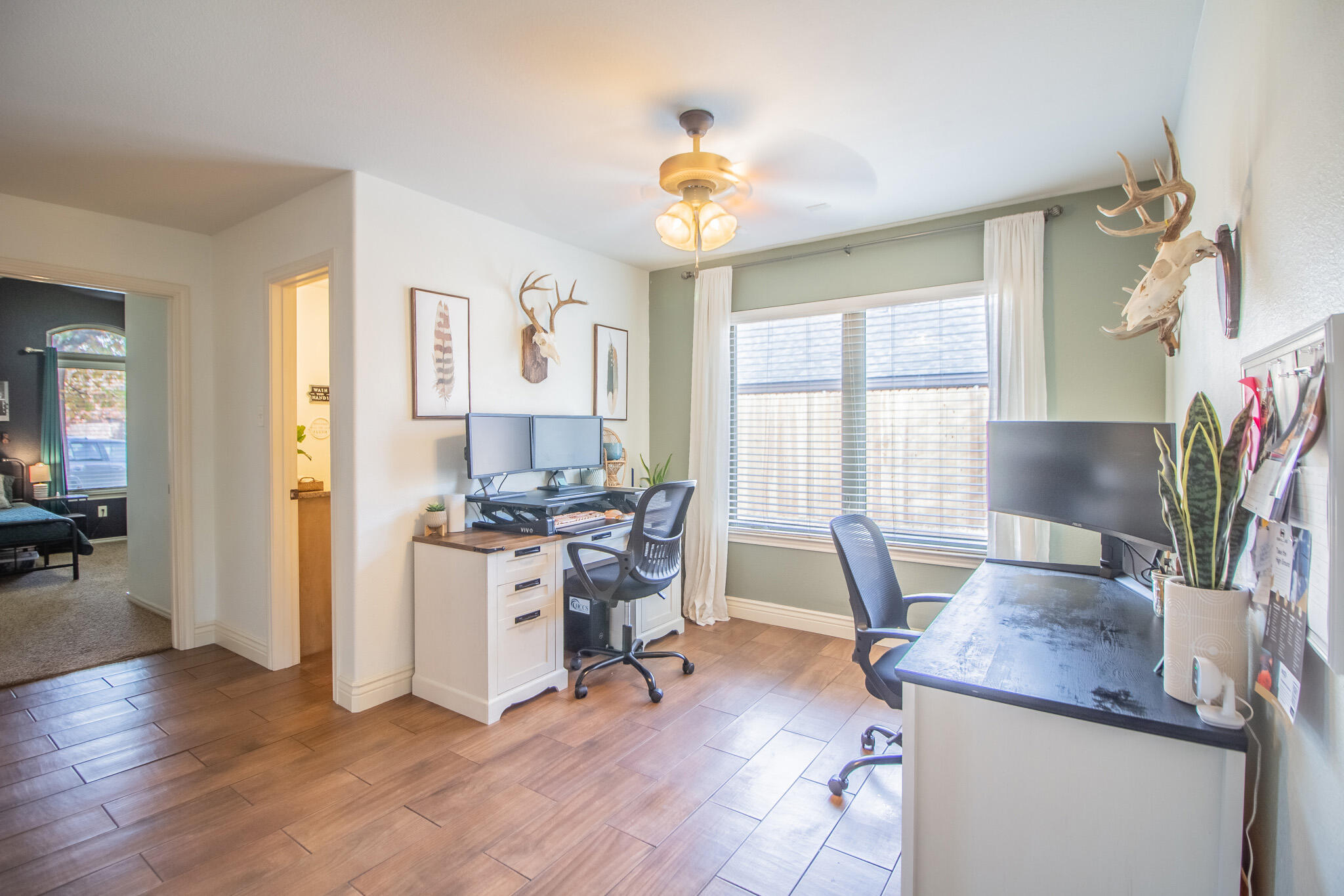 3013 110th Street Lubbock, TX 79423 - Photo 14 of 22 a view of a livingroom with furniture and a window