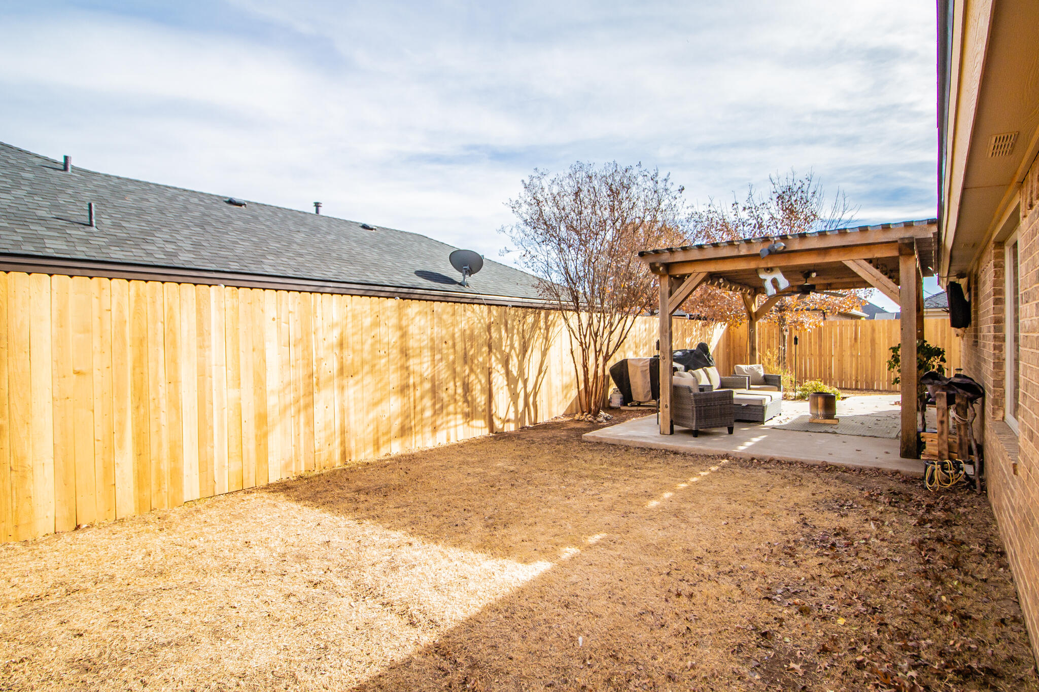 3013 110th Street Lubbock, TX 79423 - Photo 22 of 22 a view of a room with window and furniture