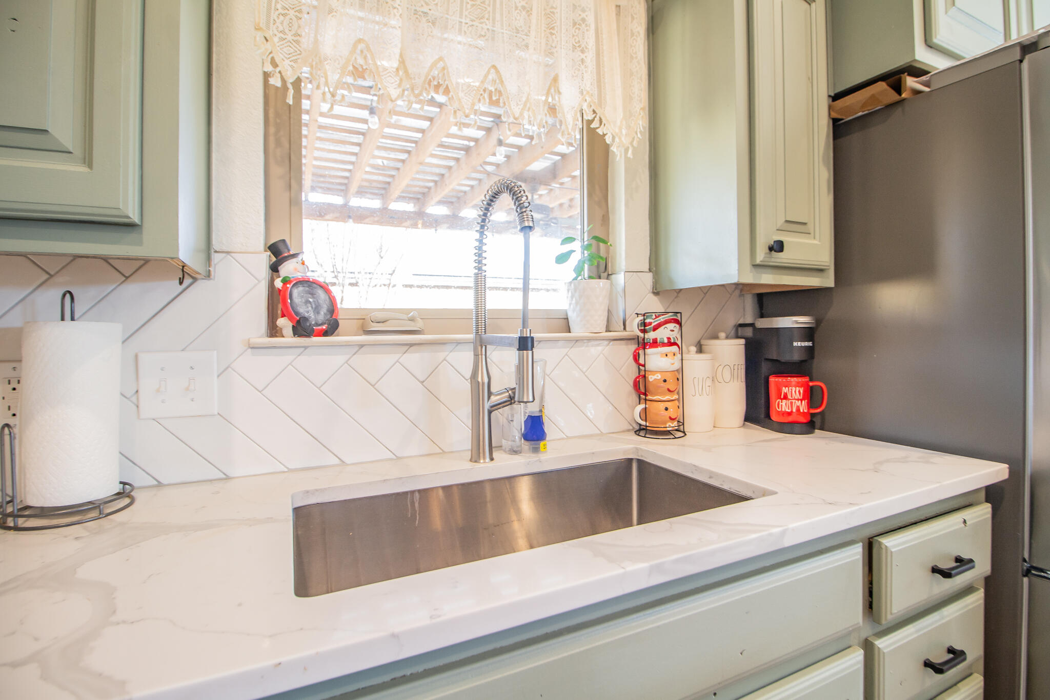 3013 110th Street Lubbock, TX 79423 - Photo 10 of 22 a kitchen with a sink and a window