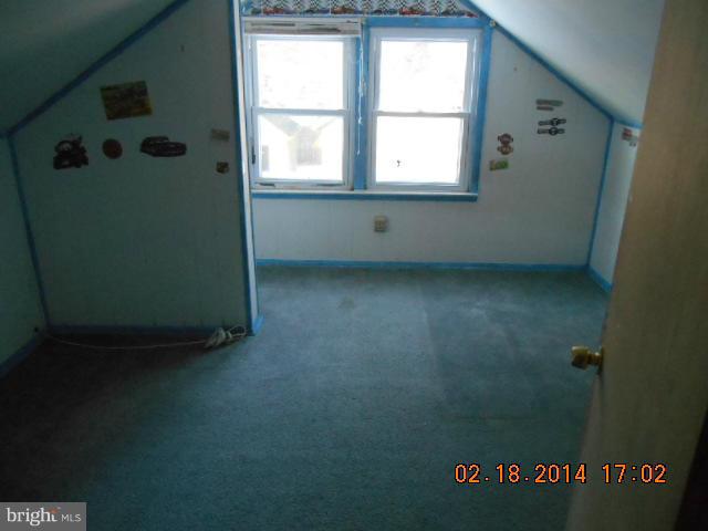 926 Martin Road Baltimore, MD 21221 - Photo 14 of 15 an empty room with windows