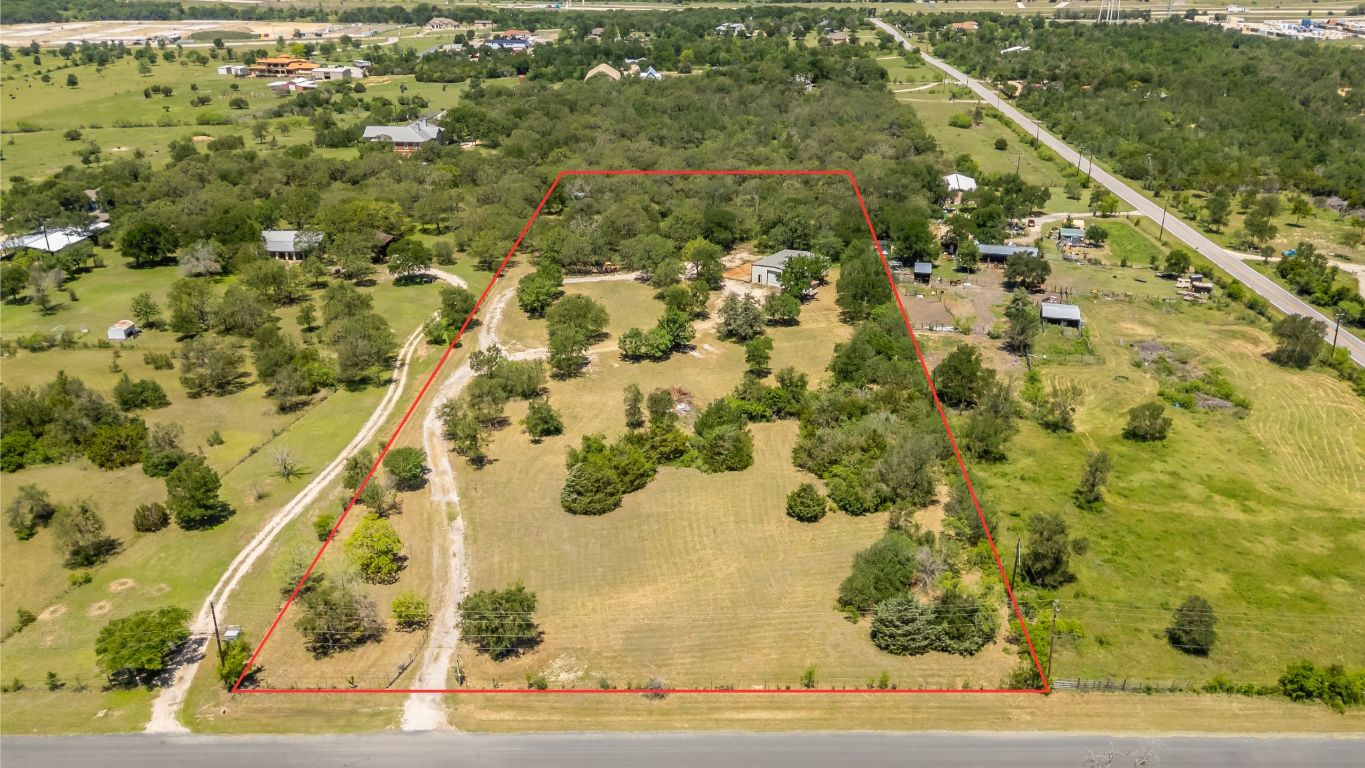 a view of a yard with an outdoor space