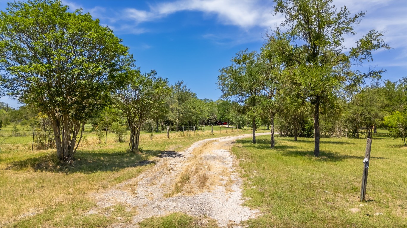 7502 Wells Trace Manor, TX 78653 - Photo 25 of 31 a view of a yard with swimming pool