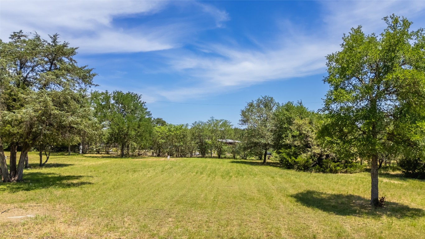 7502 Wells Trace Manor, TX 78653 - Photo 27 of 31 a view of swimming pool with a yard