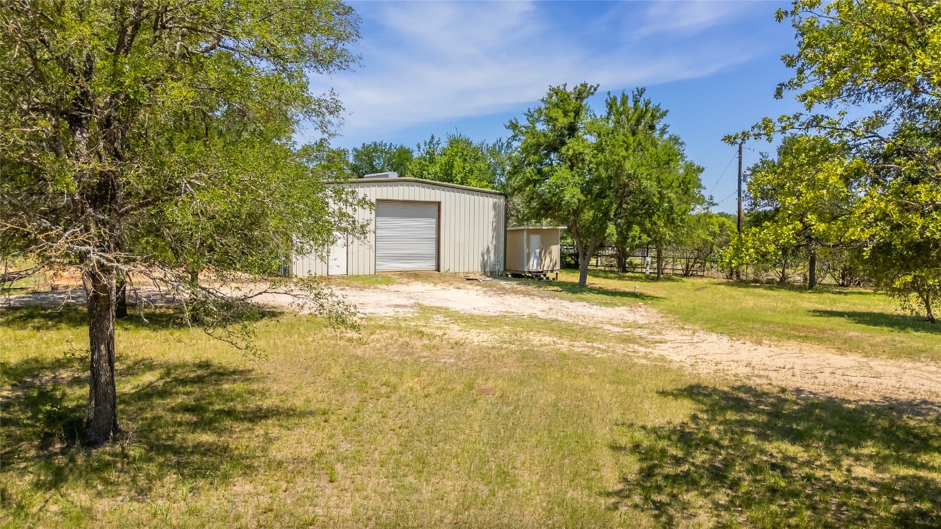 7502 Wells Trace Manor, TX 78653 - Photo 3 of 31 a view of swimming pool with an outdoor space
