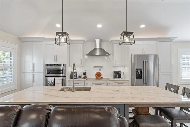 $784,000 | 11812 Lakeshore Drive, Clermont, FL 34711