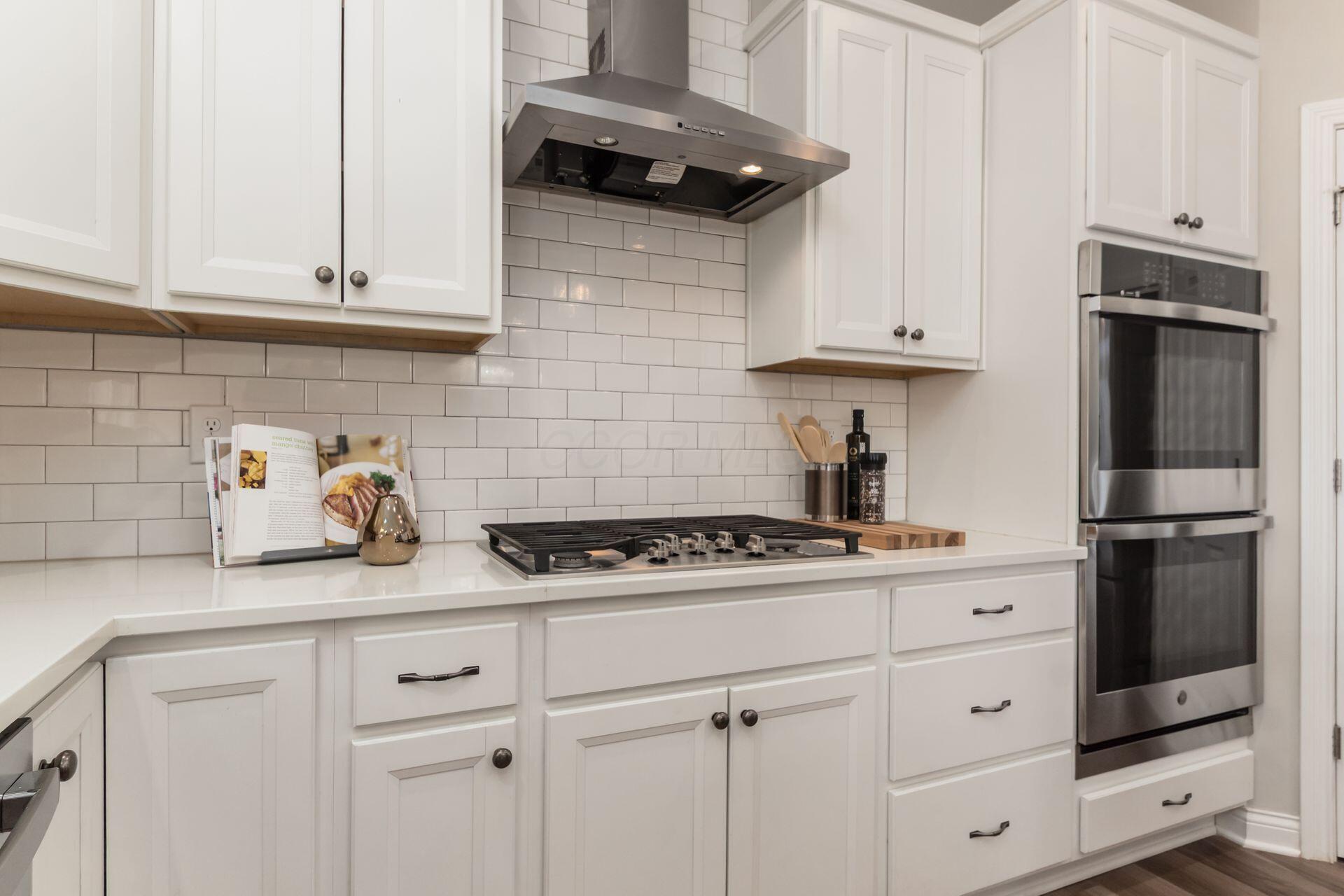 239 Harness Way Delaware, OH 43015 - Photo 10 of 45 Desirable stainless appliances, gas range & double ovens.