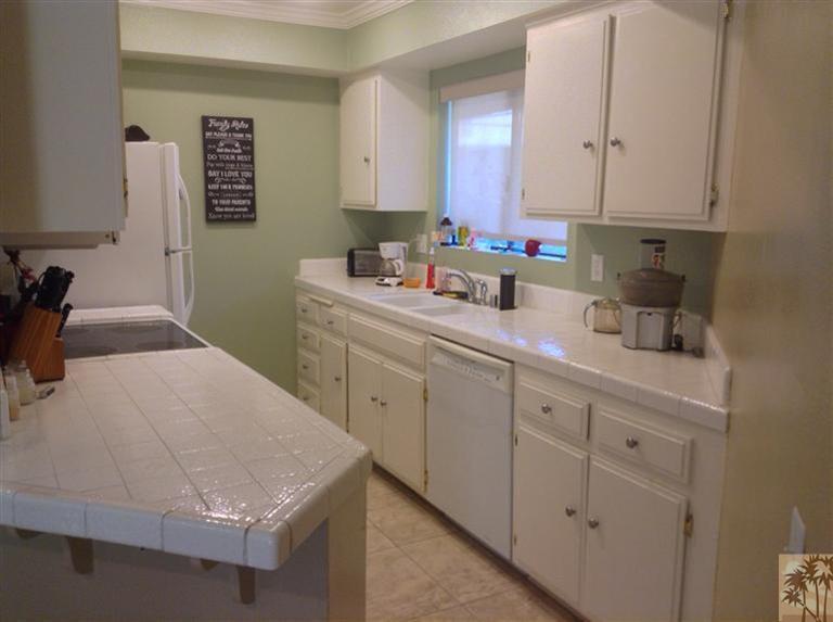 71862 Eleanora Lane Rancho Mirage, CA 92270 - Photo 3 of 3 a kitchen with a sink and cabinets