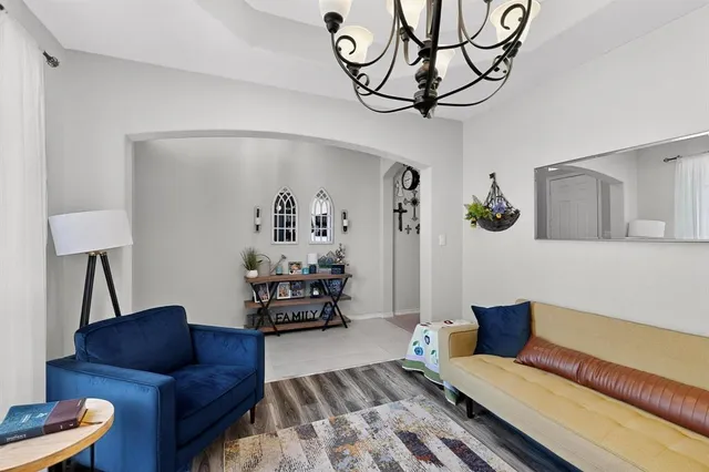 a living room with furniture and a couch