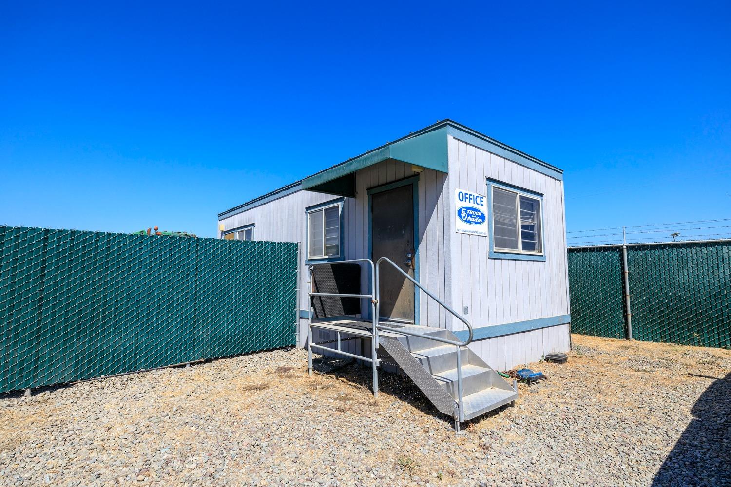 7831 Crows Landing Road Ceres, CA 95307 - Photo 11 of 23 a house with trees in the background
