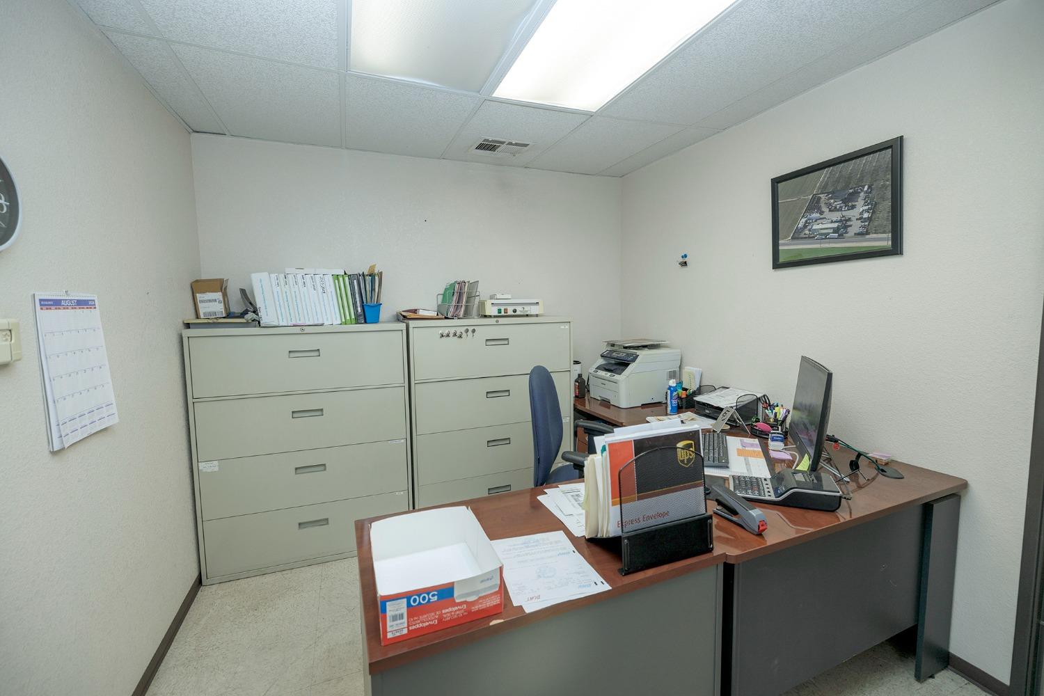 7831 Crows Landing Road Ceres, CA 95307 - Photo 14 of 23 a room with a desk and chair