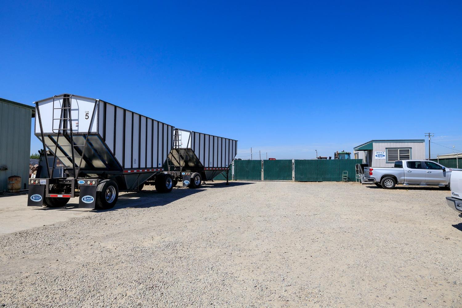 7831 Crows Landing Road Ceres, CA 95307 - Photo 2 of 23 a view of a car in the back of a house