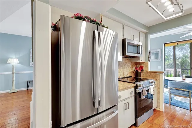 a bedroom with a bed and a mirror