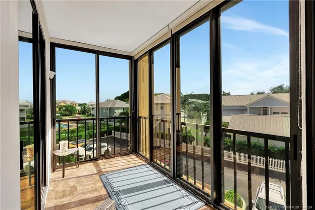 a bedroom with a bed and a television in it