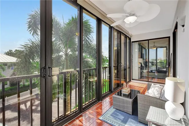 a bathroom with a granite countertop sink mirror vanity and toilet