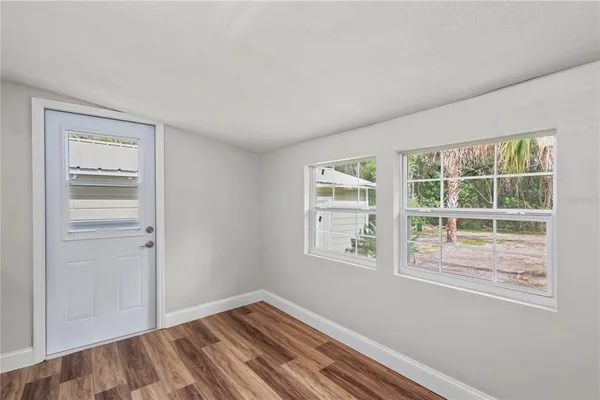 a view of an empty room with a window