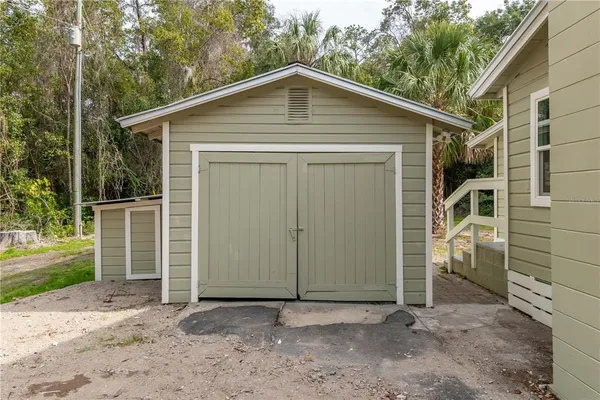 a white house with a outdoor space