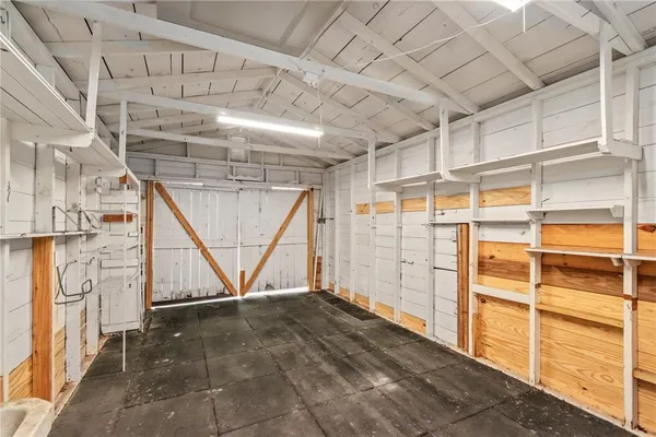 a view of an empty room with a windows