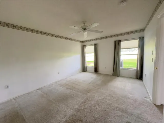 a bathroom with a sink mirror toilet and bathtub