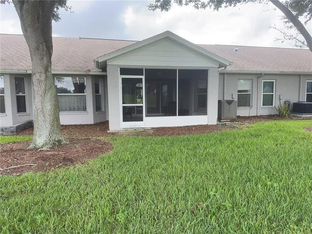 a view of a porch with a yard