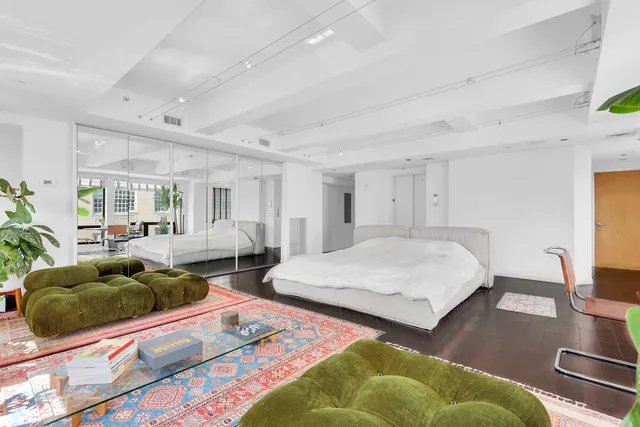 a view of a building with sitting area