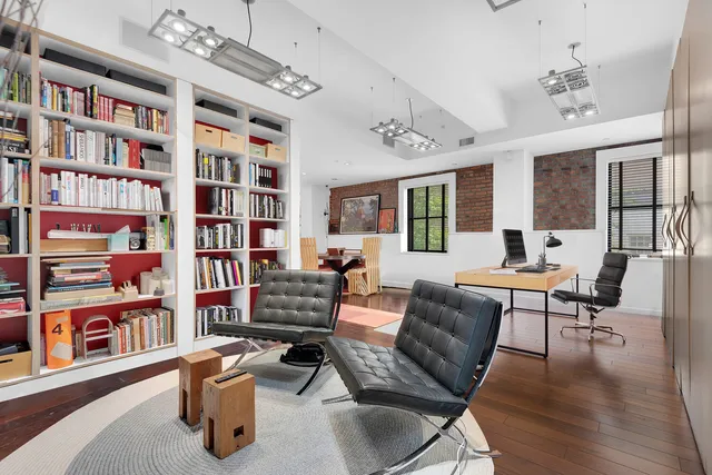 a view of a livingroom with furniture and window