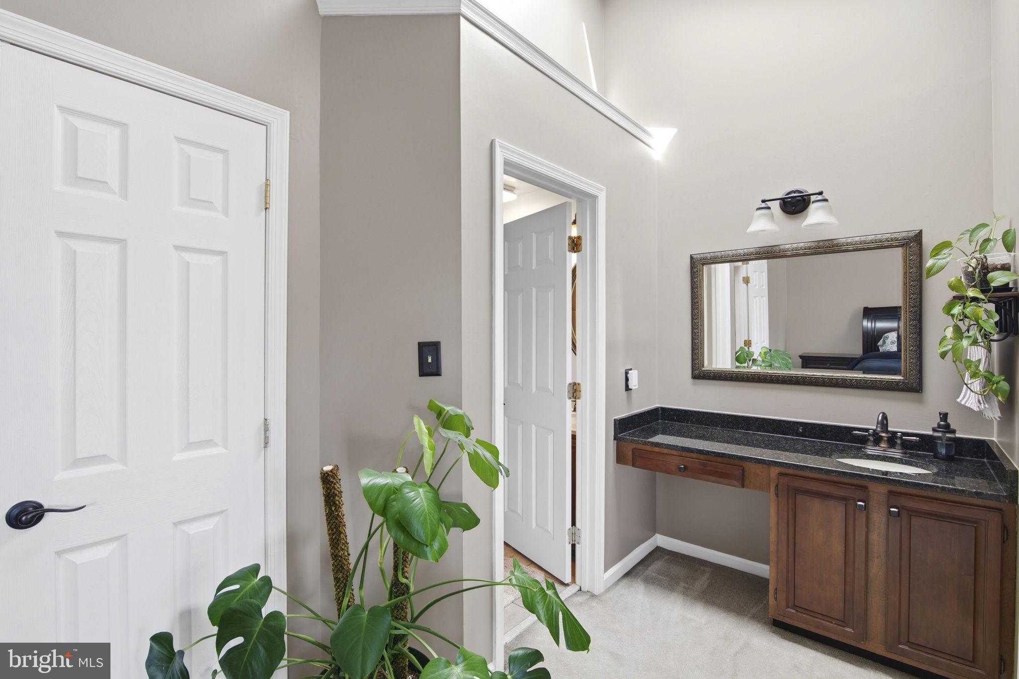 2005 Pointview Circle Forest Hill, MD 21050 - Photo 13 of 32 a spacious bathroom with a granite countertop sink a mirror and a shower
