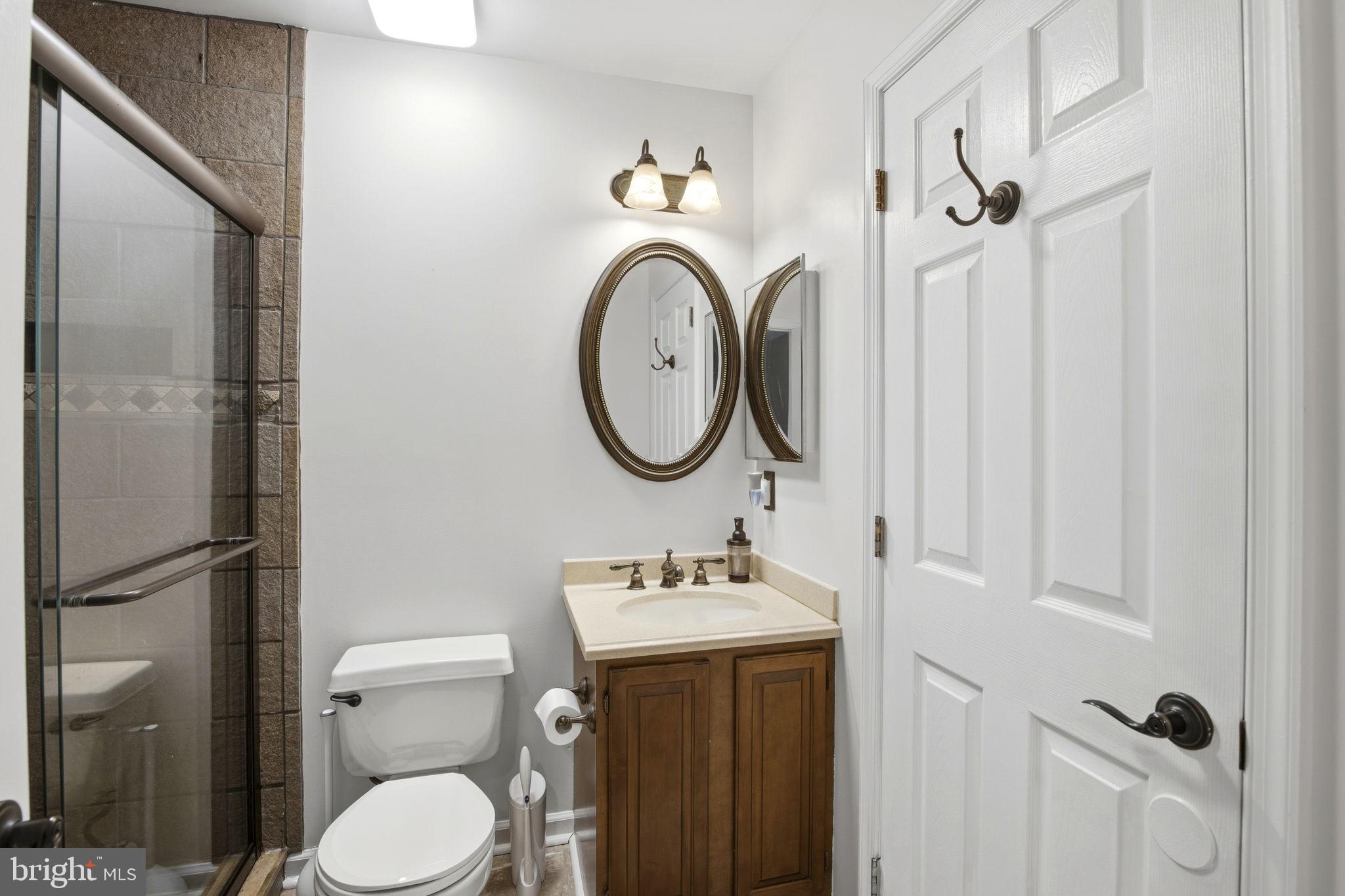 2005 Pointview Circle Forest Hill, MD 21050 - Photo 14 of 32 a bathroom with a sink a toilet and a mirror