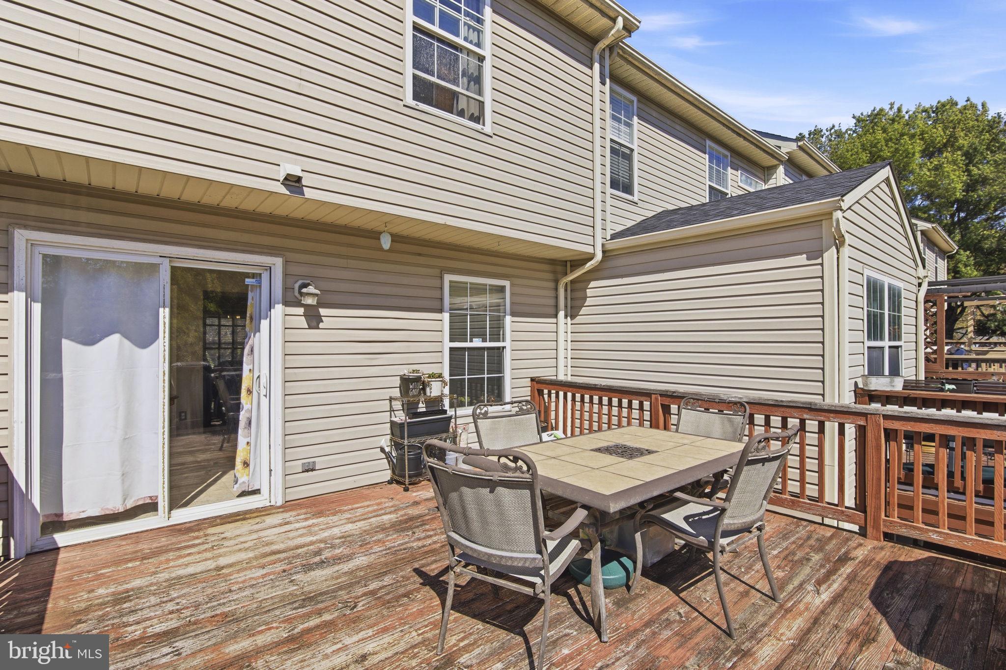 2005 Pointview Circle Forest Hill, MD 21050 - Photo 26 of 32 a view of a patio with a table and chairs