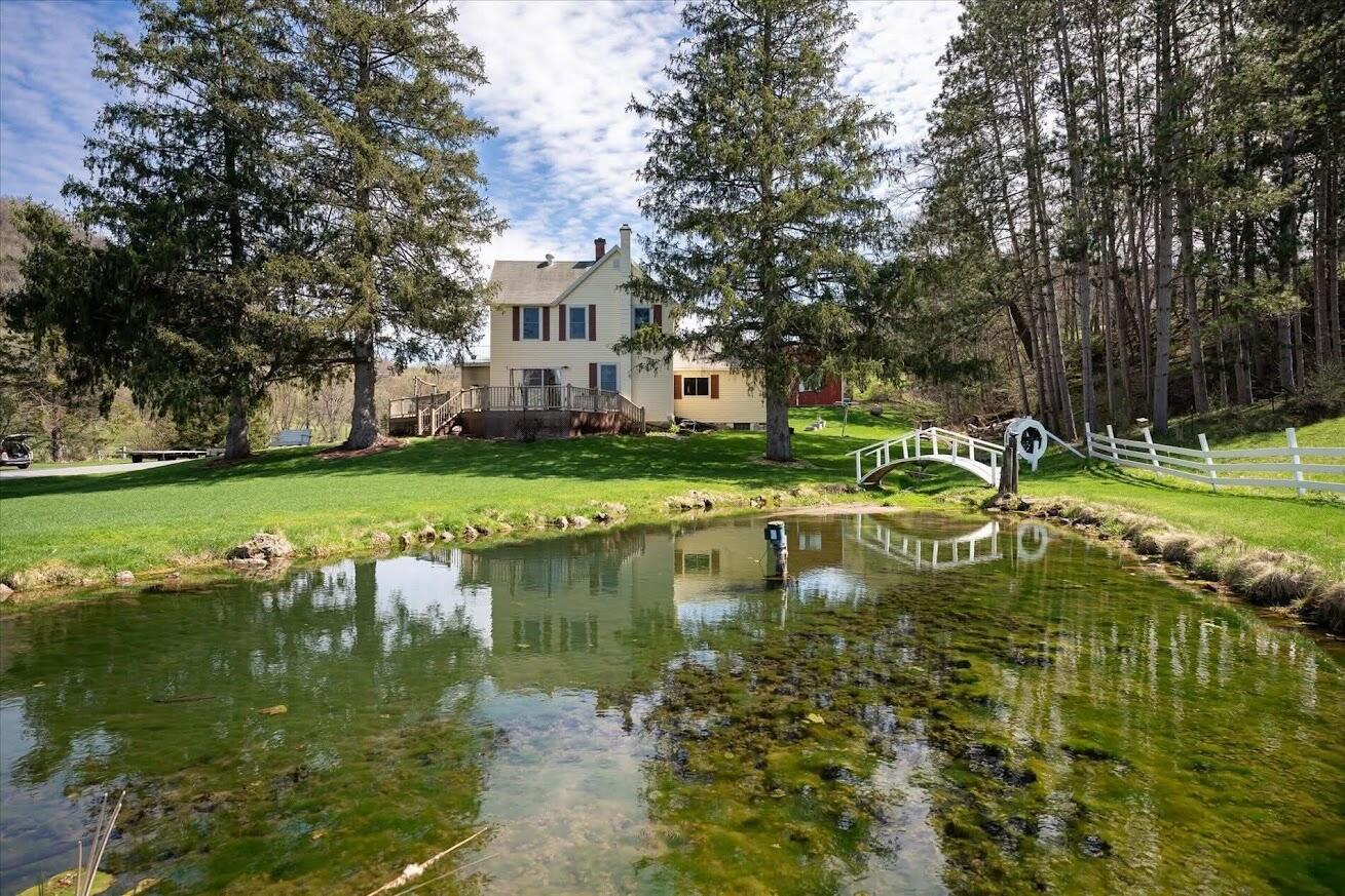 S921 Sveum Ridge Road Coon, WI 54623 - Photo 19 of 22 Trout pond with aerator