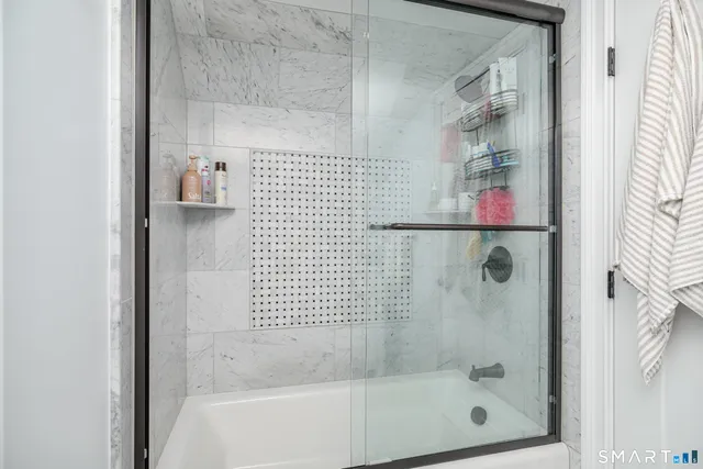 a bathroom with a bathtub