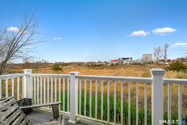 a view of a balcony with an ocean view