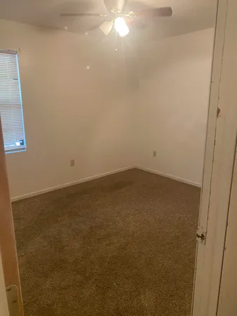 a view of a room with an empty space
