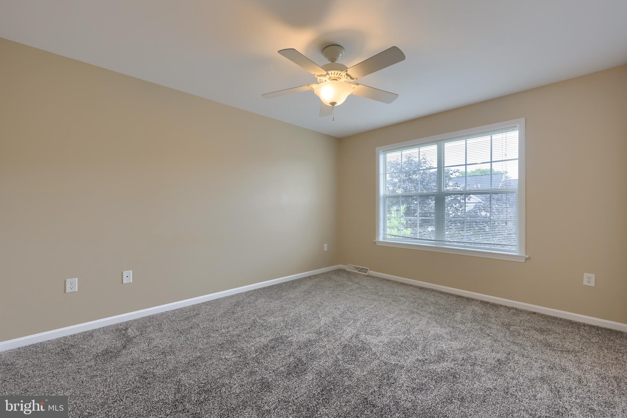 619 Chatham Way Lititz, PA 17543 - Photo 21 of 32 an empty room with windows and fan