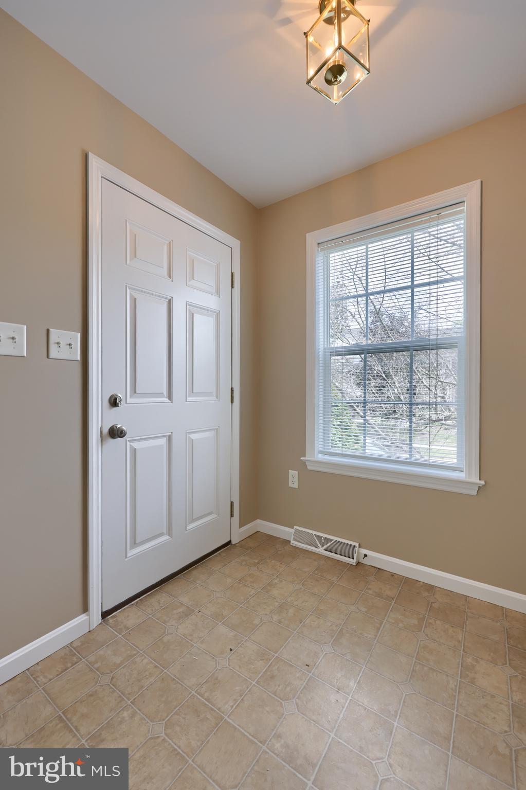 619 Chatham Way Lititz, PA 17543 - Photo 6 of 32 a view of an empty room with a window