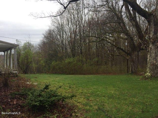 51 Norfolk Road Sandisfield, MA 01255 - Photo 11 of 11 a view of outdoor space with green field and trees