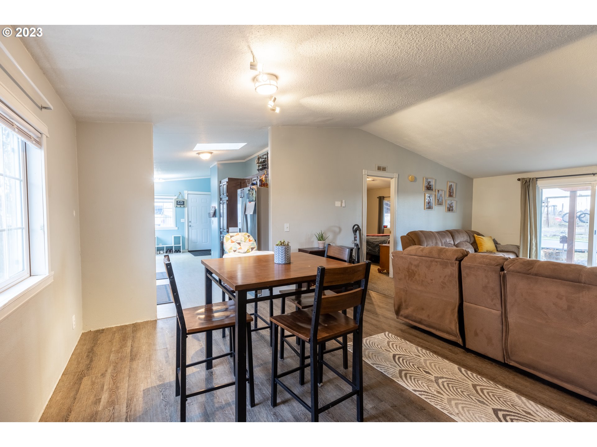 78390 Agnew Road Hermiston, OR 97838 - Photo 16 of 27 a view of a dining room with furniture and window
